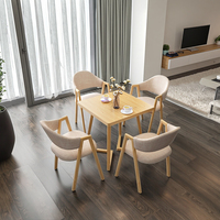 Petite table à manger carrée moderne en bois pour les salons de réception, les négociations, les salons de desserts ou de thé au lait dans les petits appartements