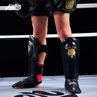 Équipement d'entraînement MMA imperméable de la plus haute qualité pour enfants et adultes, vente en gros de protège-tibias en cuir, protection du cou-de-pied pour la boxe et le combat