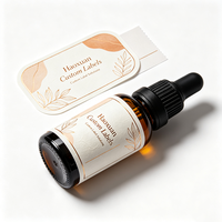 Étiquettes personnalisées Haoxuan pour flacons d'huile de beauté, autocollants en papier d'art gaufré à l'or pour emballages cosmétiques haut de gamme