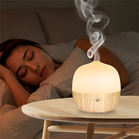 Diffuseur d'arôme d'huile essentielle à ultrasons de mini conception populaire humidificateur d'air d'aromathérapie à lumière LED 7 couleurs changeantes