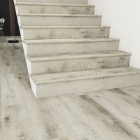 Profilé de marche d'escalier moderne en SPC/WPC, résistant à l'eau, écologique, avec nez de marche assorti pour la décoration de villas et d'appartements