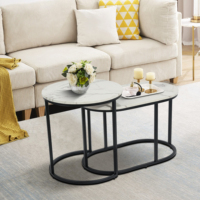 Ensemble de 2 tables basses gigognes modernes rondes en bois marbré blanc, table d'appoint, cadre en métal noir, plateau ovale blanc et pied noir
