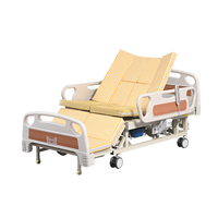 Lit médical multifonctionnel manuel de luxe par un fabricant chinois, 5 fonctions avec commode pour les soins à domicile des personnes âgées