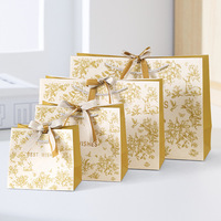 Sacs cadeaux en papier laminé de luxe personnalisés avec logo et poignées pour l'emballage commercial de Noël, vente au détail, shopping