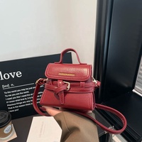 2026 Neue Trendige Bonbonfarbene Mädchen-Minihandtasche aus PU-Leder Modische Damen-Geldbörse Tragbare Frauen-Mini-Umhängetasche