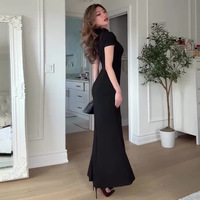 Robe longue noire moulante sexy à col montant et fente latérale, style vintage automne 2026, pour femme européenne et américaine