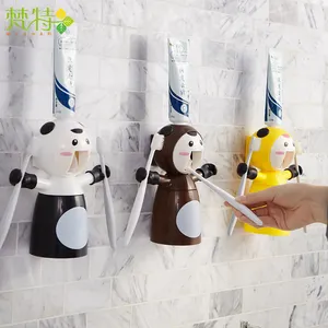 Wholesale cartoon cute high quality yellow bathroom set toothbrush holder with toothpaste dispenser