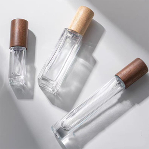 ขวดน้ำหอมทำจากแก้วใสขนาด10มล. 15มล. ขวดสเปรย์พร้อมฝาไม้ - Product Image 1