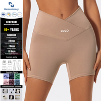 Shorts de yoga taille haute unis pour femme avec effet ventre plat croisé en V et rehaussement des fesses pour la gym, le Pilates et la course à pied
