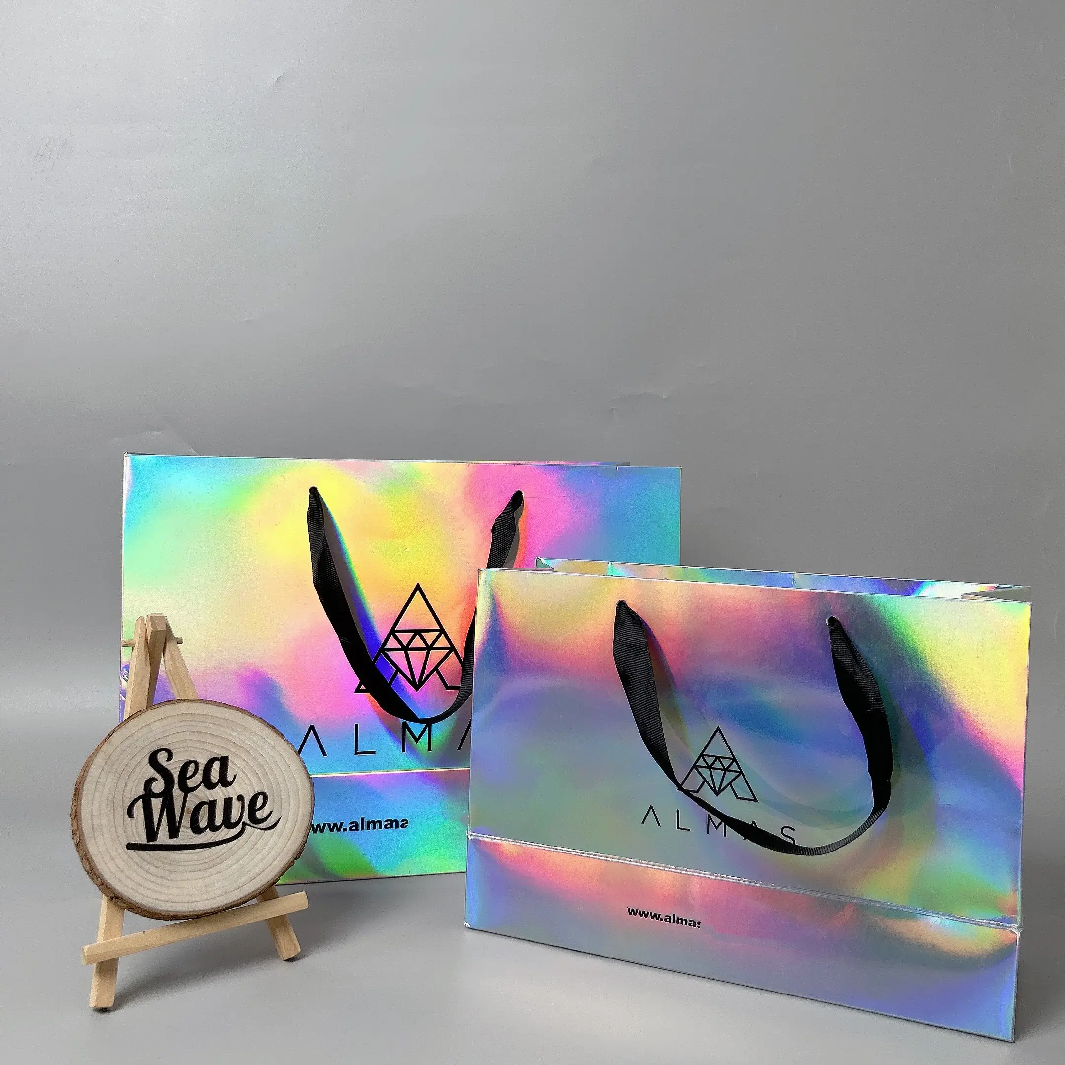 Sacchetto di carta olografico di lusso personalizzato sacchetto di carta regalo sacchetti di carta per la spesa in tessuto con loghi