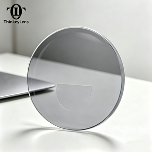 Lentes Ópticas Bifocales Fotocromáticas 1.56, Parte Superior Plana, <span class=keywords><strong>Multifocales</strong></span>, Transición Gris, HMC, 70mm de Diámetro, Económicas - Product Image 1
