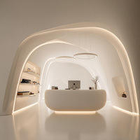 Bureau d'accueil extensible moderne en forme de vague, surface en PETG imitation pierre, pour hôtels de luxe, immeubles de bureaux, centres commerciaux, usage commercial ST