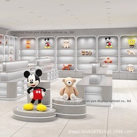 Vitrine d'exposition LED avec peinture effet cuire, miroir et panneau arrière personnalisable - Comptoir de caisse tendance pour boutique et îlot cadeau