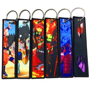 <b>Custom</b> Woven Embroidery Logo Jdm Cute Cartoon Fabric Jet Tag Keyring Keychain Sublimation Anime <b>Key</b> Chain - Product Image 3