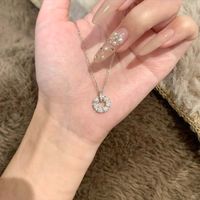 Parure de bijoux toroïdale pour femme, style européen et américain, en alliage et zircone, avec serti clos en forme de papillon, tendance, avec boucle en zircon cubique