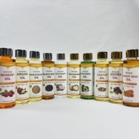 Huile Essentielle Personnalisable pour Massage et Spa : Vitamine E, Vitamine C, Jojoba, Arbre à Thé – Huile Corporelle Naturelle Hydratante et Éclaircissante