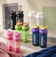 Bouteille shaker sport portable avec couvercle support téléphone, tasse mélangeuse de protéines avec couvercle à clapet et marques de volume pour le fitness