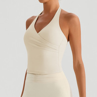 Tops activos de entrenamiento sin costuras transpirables a la moda para mujer Top de Primavera de talla grande PDS incorporado con cuello Halter de compresión