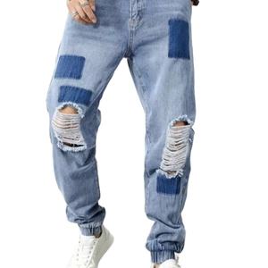 Wholesale Custom Men's Ripped Stitching <b>Jogging</b> Jeans Street Wind Ripped Stitching Boys Jeans - Product Image 1