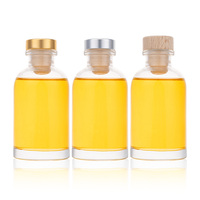 Vente en gros de flacons diffuseurs de parfum en verre ronds vides de 100 ml avec boîtes d'emballage personnalisées pour l'utilisation d'huiles essentielles