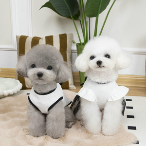 Venta al por mayor: Vestido sencillo y moderno <span class=keywords><strong>en</strong></span> blanco y negro con lazo para perros y gatos, chaleco y falda bonitos de invierno hechos de poliéster para uso <span class=keywords><strong>en</strong></span> verano. - Product Image 6