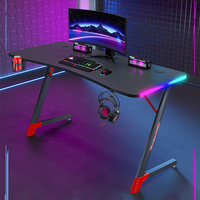 Bureau de jeu pour ordinateur en fibre de carbone noire avec éclairage d'ambiance RGB pour la maison et les bureaux e-sportifs (vente en gros)