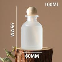 Vente en gros 100ml rond mat noir Difusor parfum d'ambiance bouteille de luxe vide diffuseur d'arôme d'aromathérapie en verre Diffuseur d'arôme de roseau
