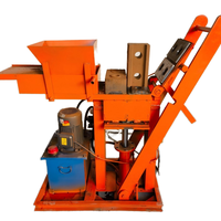 Machine manuelle de moulage de blocs creux en béton Machine efficace de fabrication de briques avec moteur principal Ligne de production de ciment