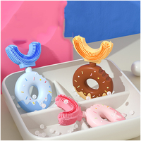 Nouveau Style 360 doux enfants beignet beignet brosse Silicone en forme de U enfants brosse à dents pour la vente en gros