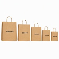 Sac de shopping en papier kraft pour boutique de vêtements et de chaussures, avec logo personnalisé imprimé, poignée en papier torsadé, emballage de vente au détail