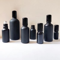 Spot 5ml 10ml 20ml 50ml 100ml bouteille d'huile essentielle givrée noire bouteille de boule en verre