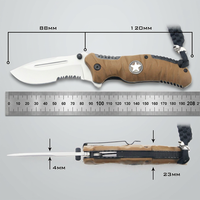 Couteau pliant EDC d'extérieur avec manche en ABS surmoulé en caoutchouc, lame en acier 3Cr13 finition oxyde noir, pointe ciselée, verrouillage Liner Lock et bouton de pouce