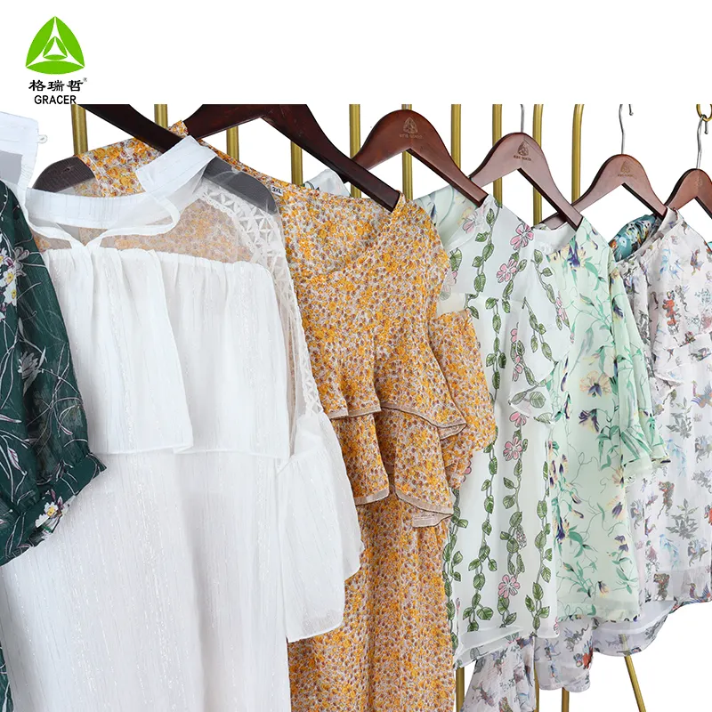 उच्च गुणवत्ता महिलाओं रेशम ब्लाउज गांठें इस्तेमाल किया कपड़े थाईलैंड से