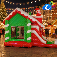 Château gonflable à thème de Noël, combo château gonflable avec toboggan pour la décoration d'événements de vacances en plein air