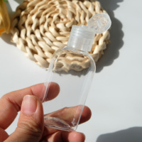 Flacon de gel désinfectant pour les mains en plastique transparent plat de 30 ml et 60 ml