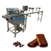 Machine automatique de tempérage et d'enrobage au chocolat, état neuf, pour faire fondre le chocolat au lait et à l'eau