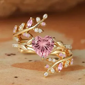 Anelli ZhuQian all'ingrosso con zirconi a forma di cuore rosa dolce per donna, gioielli di lusso placcati oro a più strati con rami delicati e brillanti - Product Image 1