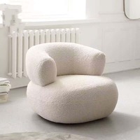 Fauteuil individuel de détente confortable en bois massif avec revêtement en tissu de luxe au design moderne