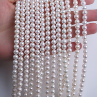 Perles rondes d'eau douce blanches de 6 à 7mm en gros de forme naturelle en vrac pour la fabrication de bijoux