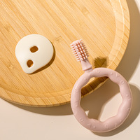 Nouvelle brosse à dents pour bébé en silicone de qualité alimentaire sans BPA, pour apaiser les gencives et soulager le stress par la stimulation sensorielle et le pressage