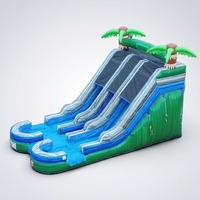 Toboggan gonflable double piste vert 15' avec revêtement PVC et installation facile, utilisable à sec ou à l'eau