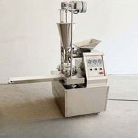 Machine à former des Baozi pour Xiaolongbao, les raviolis de soupe et les Baozi frits ; Machine à garnir en acier inoxydable de style artisanal