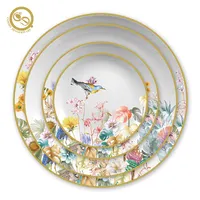 Fiore di alta qualità di stampa uccello in ceramica da tavola creativo casa reale bianco cena bone china set