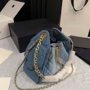 กระเป๋าถือผู้หญิงหนังแท้คุณภาพสูงระดับไฮเอนด์ กันน้ำ ความจุเยอะ สายโซ่ สไตล์วินเทจ - Product Image 4