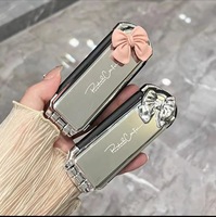 Peigne pliant portable en gros avec miroir intégré et coussin d'air, peigne de massage compact pour femmes et enfants