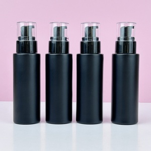 Fancy <b>Empty</b> Cylinder Round 30ml 50ml 60ml 100ml 120ml Matte Black Glass Cosmetic Emulsion Bottles Packaging With Pump - Product Image 6