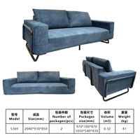 Canapé modulable gris clair effet nuage, compressé et scellé sous vide, ensemble 2 pièces avec structure métallique, idéal pour bureau ou espace de détente.