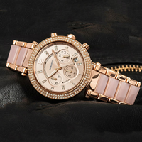 Montre pour femme en or rose avec bracelet en acier inoxydable, lunette en cristal, cadran rose brillant, montre-bracelet à quartz tendance pour soirée