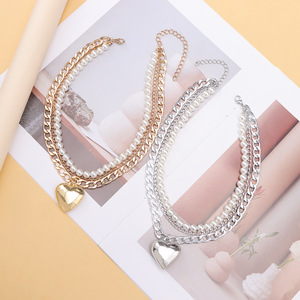 Collar con colgante de corazón y cadena de perlas de varias capas, color oro y plata, joyería de moda para fiestas - Product Image 1