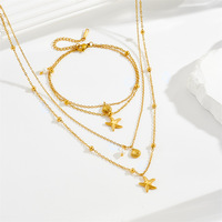 Parure de bijoux en acier inoxydable inaltérable avec zircon, motifs cœur, fleur, croix, coquillage, étoile, boucles d'oreilles, collier papillon et bracelet